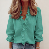 Elegáns női hosszú ujjú blúz fodros gallérral