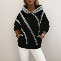 Laza fazonú női kapucnis pulóver flitteres díszítéssel – kényelmes, divatos, könnyen kombinálható