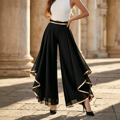 Pantaloni fustă eleganți din voal, cu talie înaltă și volane asimetrice, lejeri și transparenți, stil retro franțuzesc