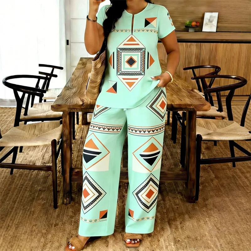🥼 Compleu de Vară Premium: Bluză cu Decolteu în V și Pantaloni Lejeri – Material Fluid, Efect de Alungire, 6 Culori, S-2XL! ✨☀️