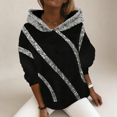 Laza fazonú női kapucnis pulóver flitteres díszítéssel – kényelmes, divatos, könnyen kombinálható