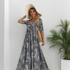 Elegáns, középhosszú női ruha növényi mintával – kényelmes, karcsúsító és sokoldalú viselet