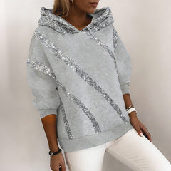 Laza fazonú női kapucnis pulóver flitteres díszítéssel – kényelmes, divatos, könnyen kombinálható