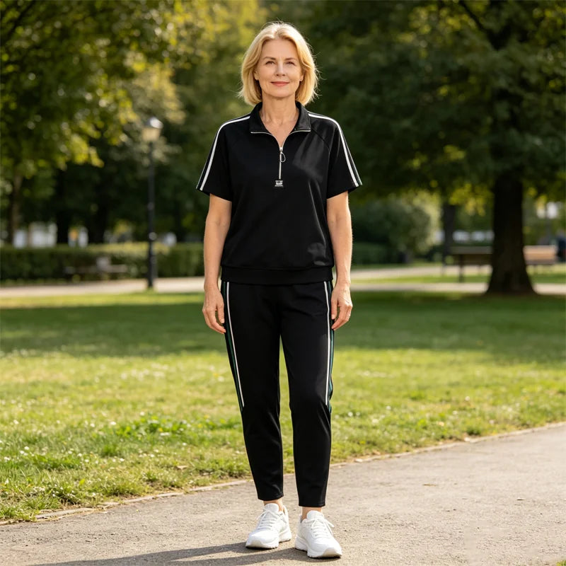 Costum Sport Casual din 2 Piese pentru Femei - Tricou cu Fermoar și Guler Polo, Pantaloni Lungi cu Dungi Laterale, Material Moale și Elastic de Vară
