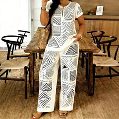 🥼 Compleu de Vară Premium: Bluză cu Decolteu în V și Pantaloni Lejeri – Material Fluid, Efect de Alungire, 6 Culori, S-2XL! ✨☀️
