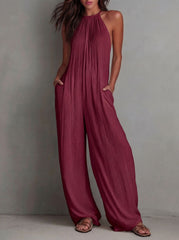 🌷👗【S-2XL】Nouă salopetă plisată de vară, cu spatele deschis și picioare largi (2026)