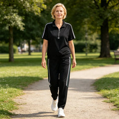Costum Sport Casual din 2 Piese pentru Femei - Tricou cu Fermoar și Guler Polo, Pantaloni Lungi cu Dungi Laterale, Material Moale și Elastic de Vară