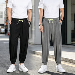 👖❄️【Cumperi 1, primești 1 gratuit】Pantaloni casual pentru bărbați, lejeri, din material ice silk, răcoroși și confortabili